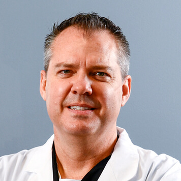 Portrait photo of doctor Walter Davies, a dentist in Tulsa, OK